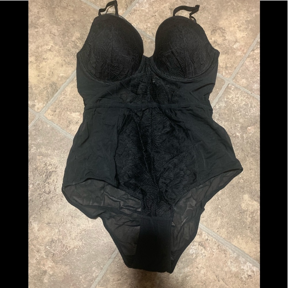 Auden med black bodysuit.